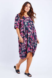 Model Laura wearing size 14 of the Rayon Bounce Dress in colour Print (Pink), from the front, showing the whole outfit