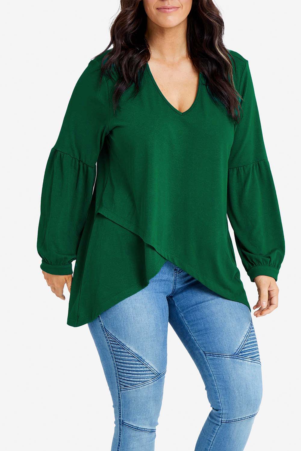 Model Laura wearing size 14 of the Preloved Hi Lo Knit Tunic in colour Emerald (Green), from the front, cropped image