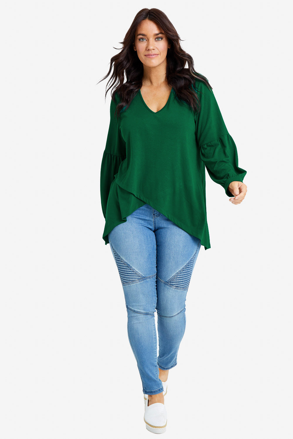 Model Laura wearing size 14 of the Preloved Hi Lo Knit Tunic in colour Emerald (Green), from the front, showing the whole outfit