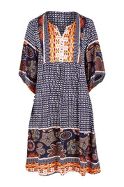 Product shot of the Sun Dress in colour Navyprint (Blue), from the front
