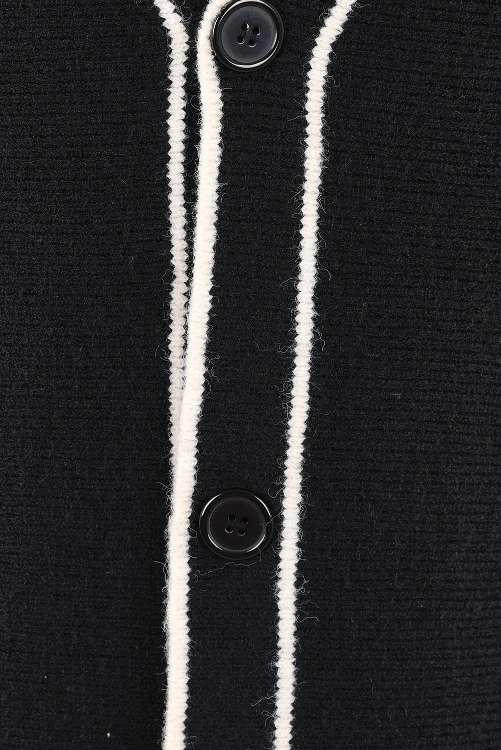 Product shot of the Avino Knit Vest in colour Black (Black), detail