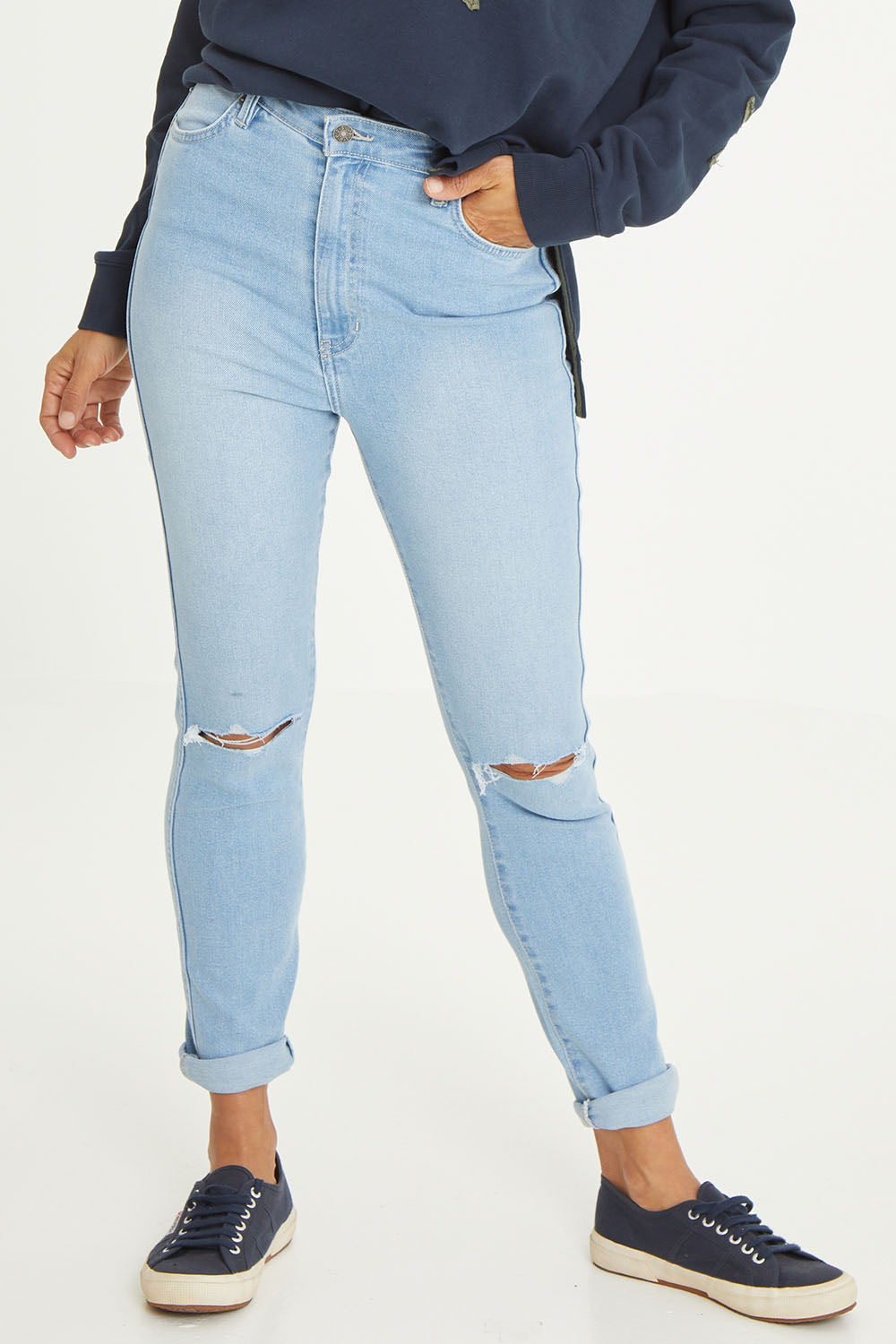 Model Cara wearing size 10 of the Hi Rider in colour Astral (Blue), from the front, cropped image