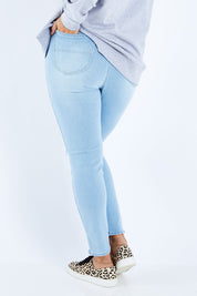 Model Sasha-Lee wearing size 16 of the Hi Rider in colour Astral (Blue), from the front, cropped image