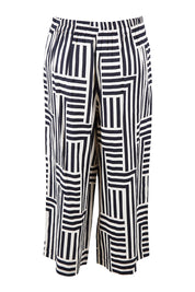 Product shot of the Bauhaus Pant in colour Navyoat (Blue), from the back