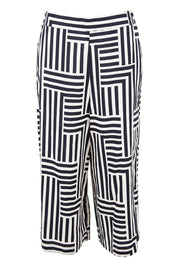 Product shot of the Bauhaus Pant in colour Navyoat (Blue), from the front