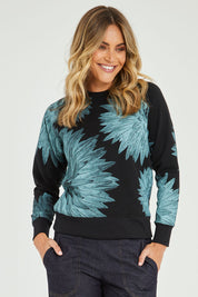 Model Alice wearing size S of the Evergreen Sweatshirt in colour Black (Black), from the front, cropped image