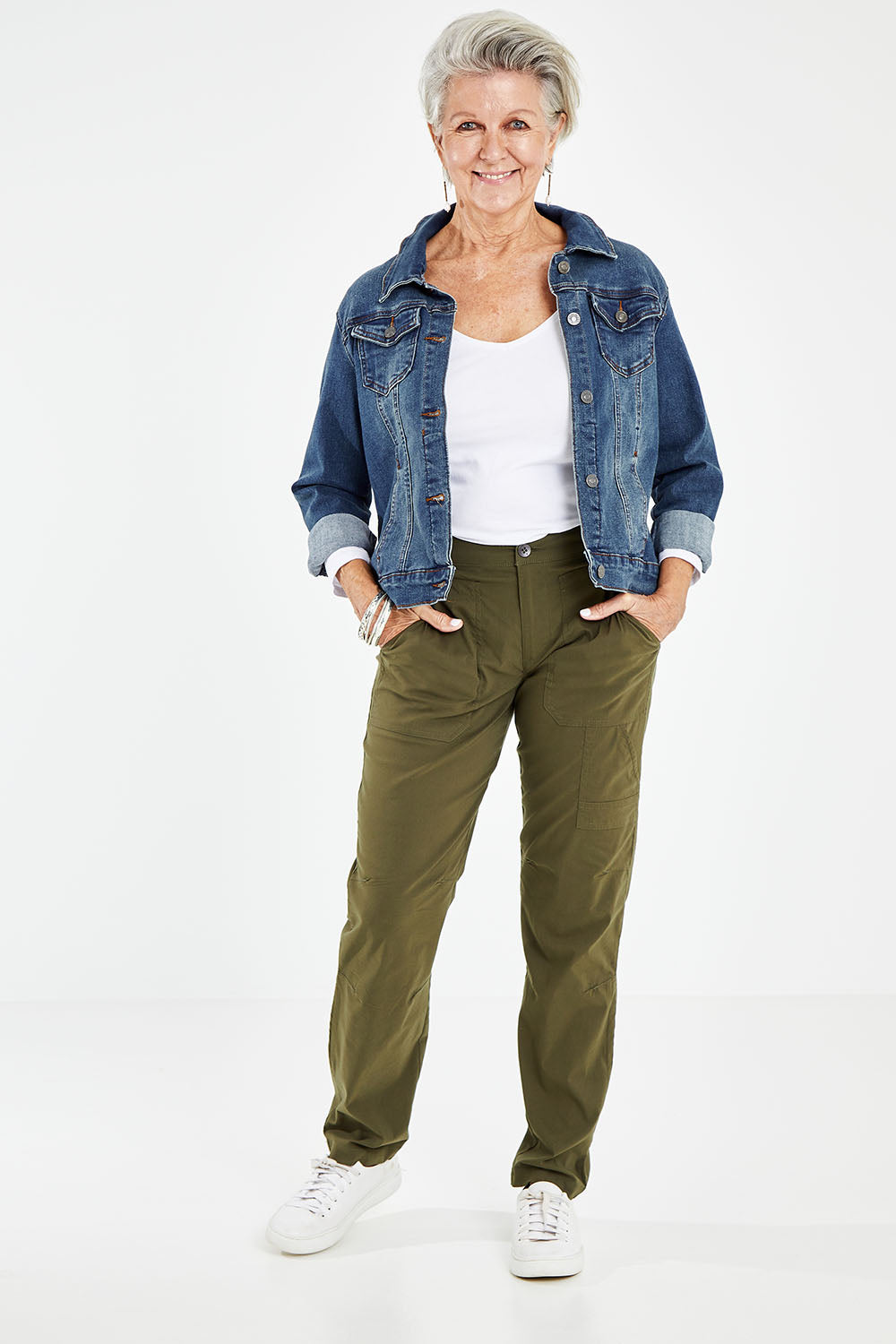 Model Elise wearing size 10 of the Signature Crafty Pant in colour Military (Green), from the front, showing the whole outfit