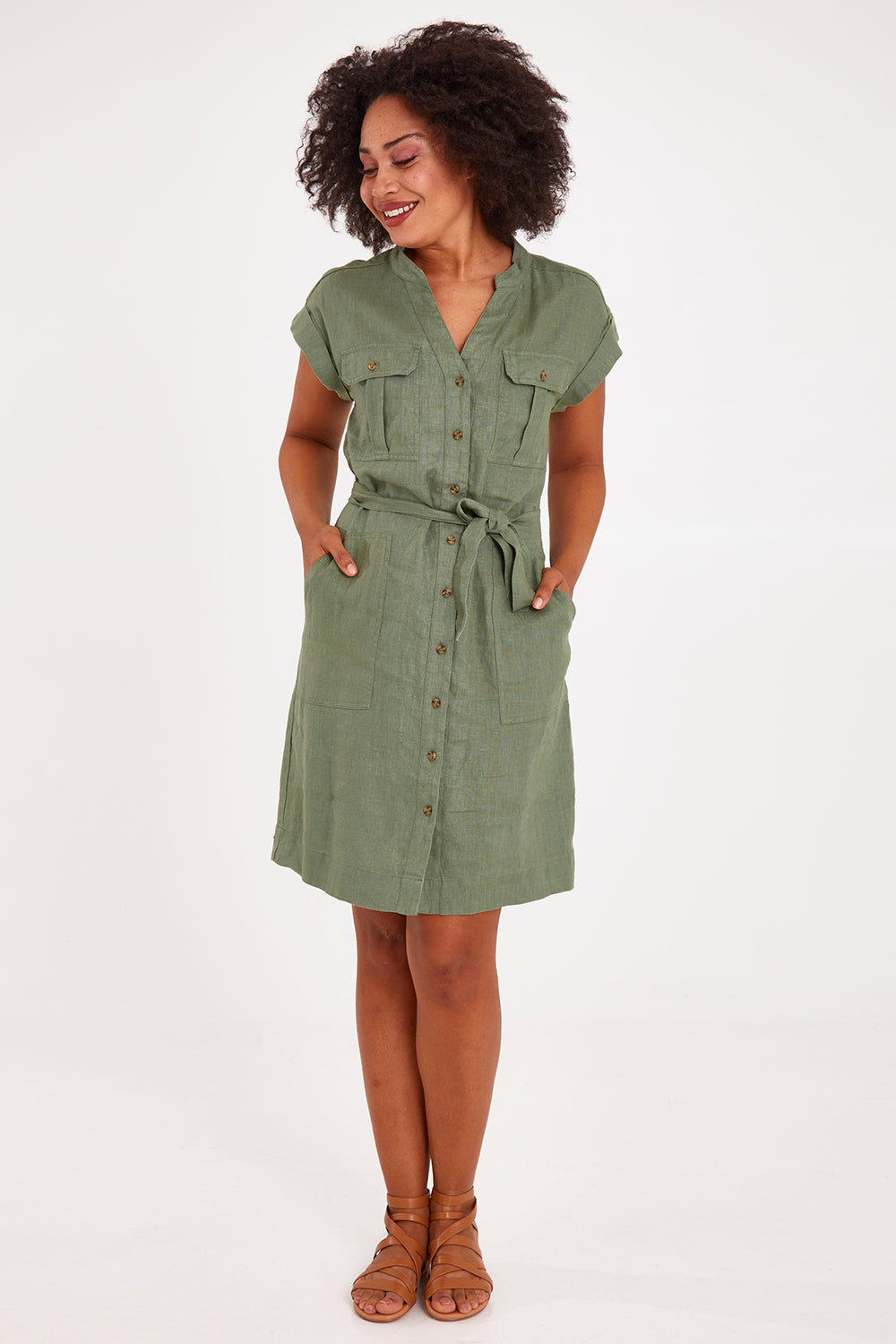Model Olivia wearing size 10 of the Harlow Dress in colour Khaki (Green), from the front, showing the whole outfit