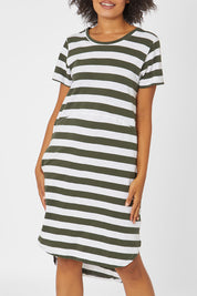Model Olivia wearing size 10 of the Elements Bayley Dress in colour Khakstripe (White), from the front, cropped image