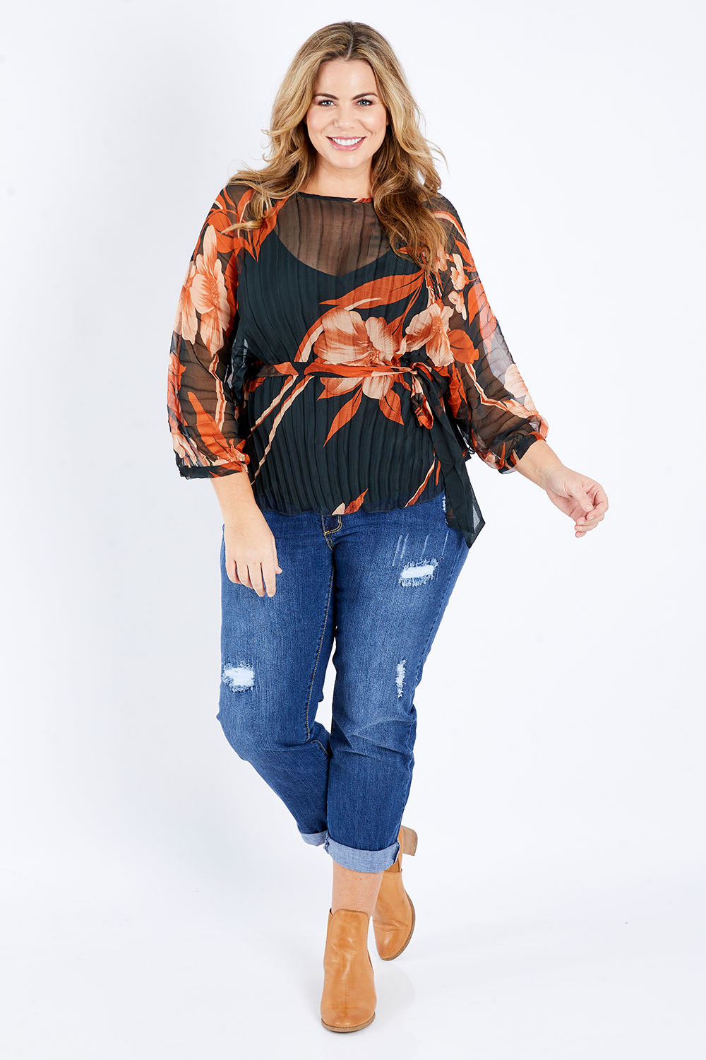 Model Fiona wearing size 16 of The Red Vineyard Top in colour Floral (Black), from the front, showing the whole outfit