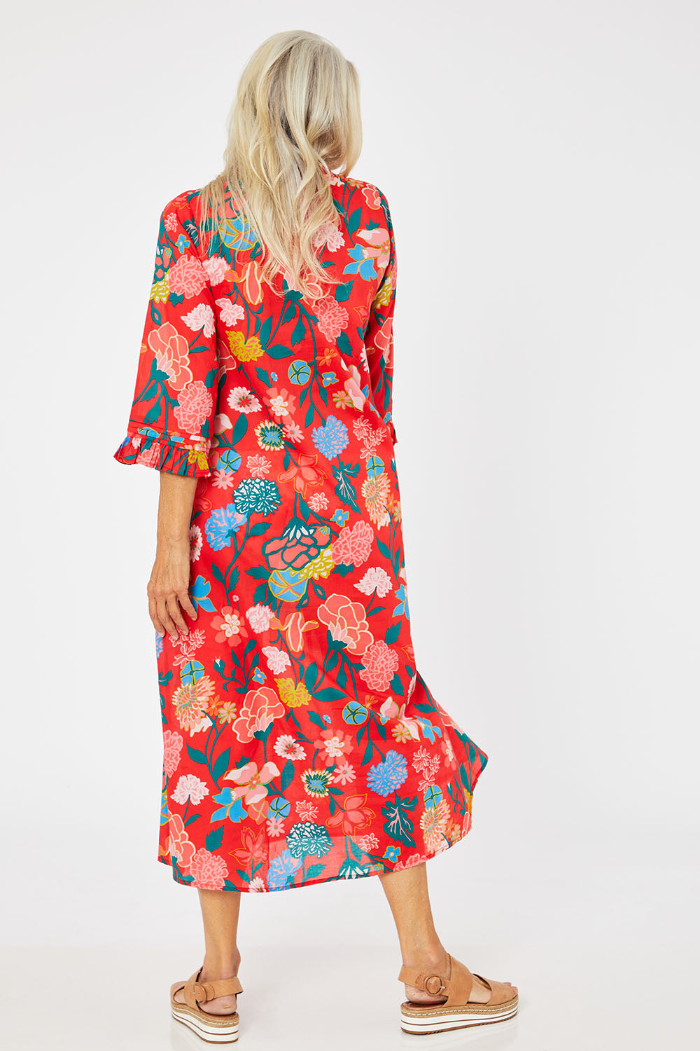 Model Rachel wearing size 10 of the Floral Tuck Front Dress in colour Red (Red), from the back