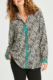 Model Emma wearing size 10 of the Animal Shirt With Green Trim in colour Emerald (Green), from the front, cropped image