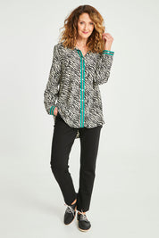 Model Emma wearing size 10 of the Animal Shirt With Green Trim in colour Emerald (Green), from the front, showing the whole outfit
