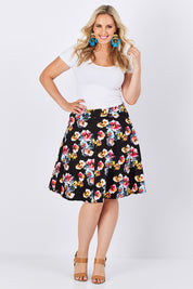 Model Jess wearing size 14 of the Printed Swing Skirt in colour Comical (Black), from the front, showing the whole outfit