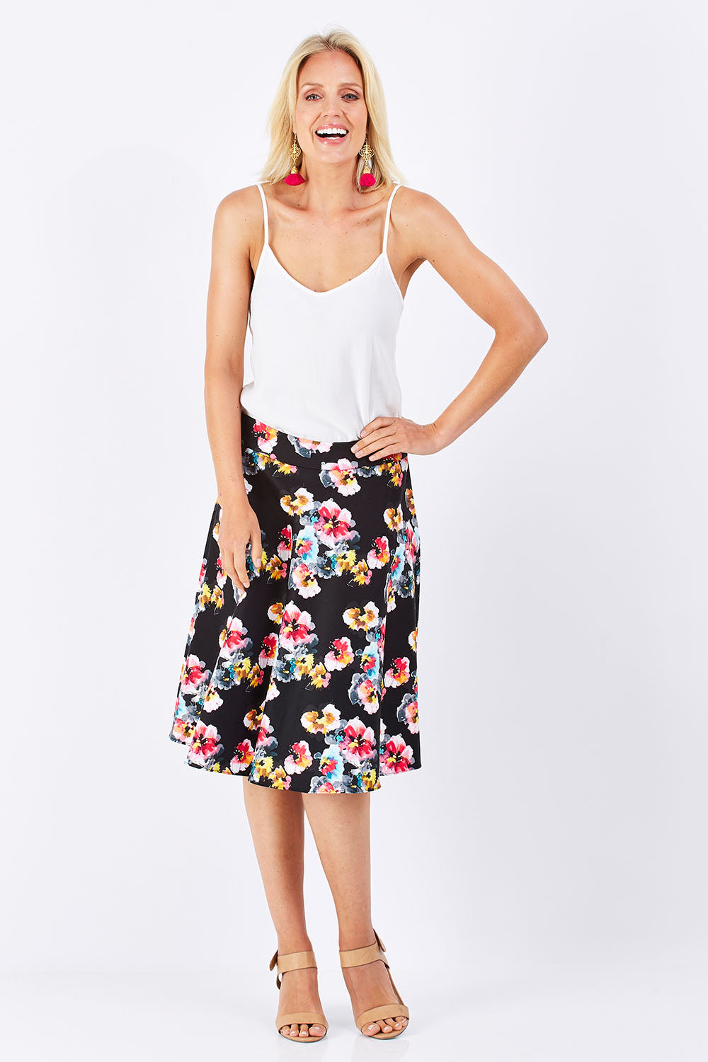 Model Jude wearing size 10 of the Printed Swing Skirt in colour Comical (Black), from the front, showing the whole outfit