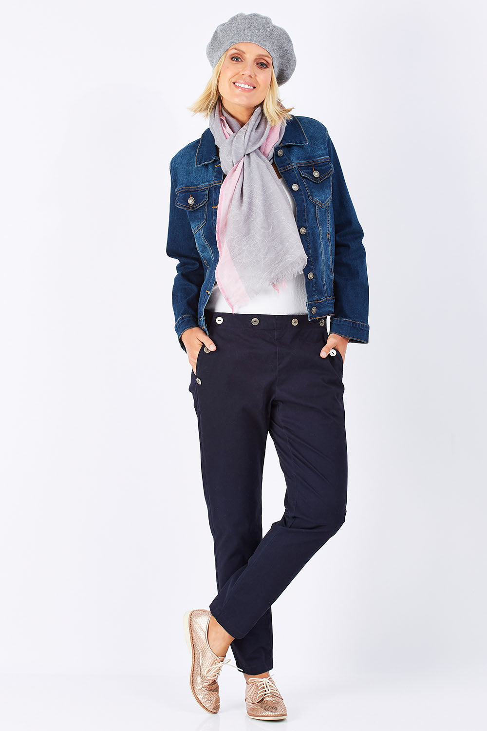 Model Jude wearing size 10 of the Sailor Pants in colour Sailor (Black), from the front, showing the whole outfit
