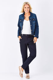 Model Jude wearing size 10 of the Sailor Pants in colour Sailor (Black), from the front, showing the whole outfit
