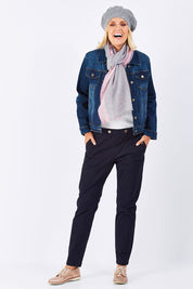 Model Jude wearing size 10 of the Sailor Pants in colour Sailor (Black), from the front, showing the whole outfit