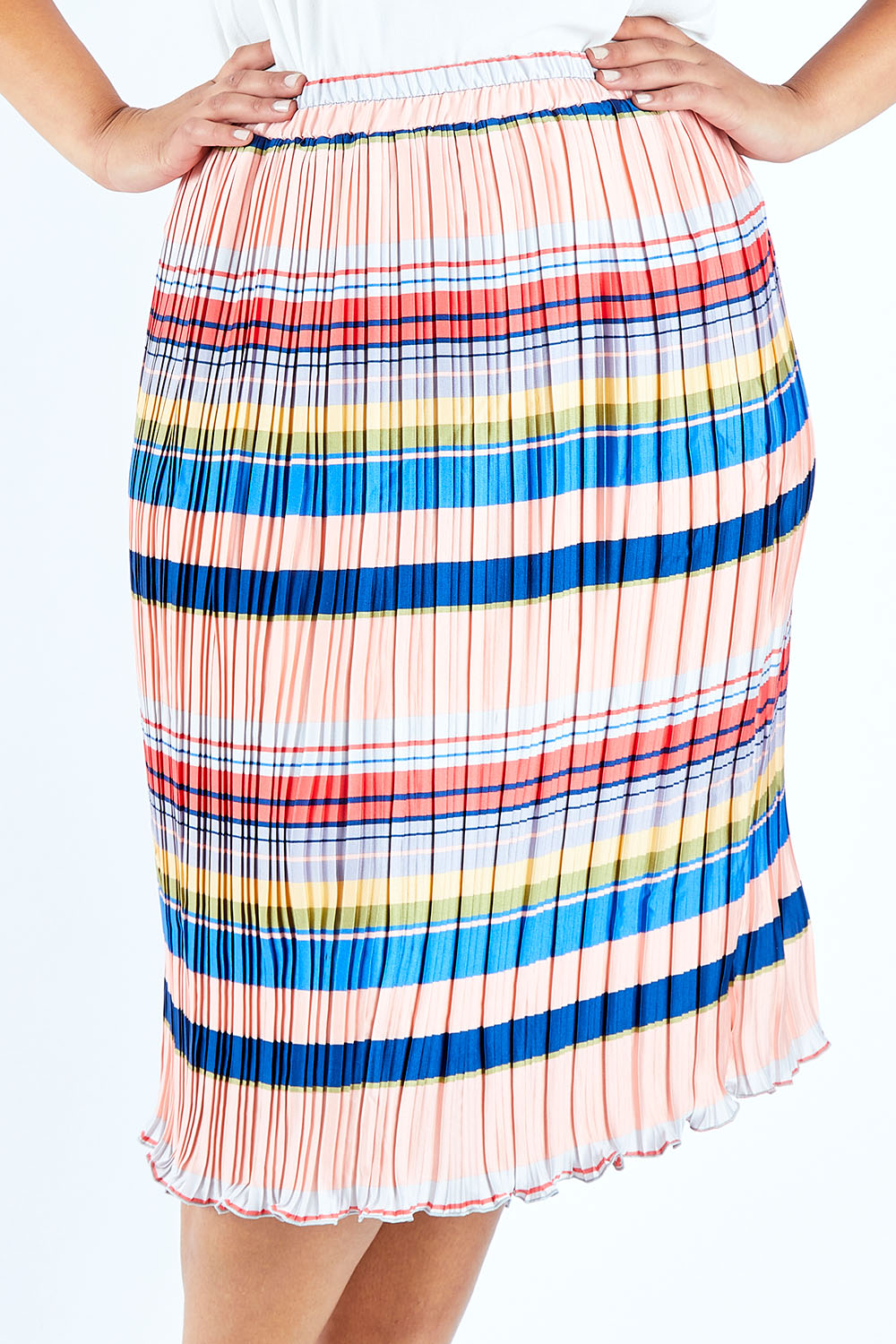 Model Lauren wearing size 18 of the Pleated Stripe Skirt in colour Pleated (Pink), from the front, cropped image