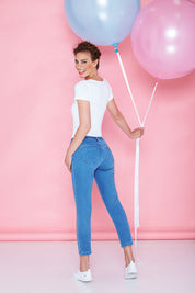 A model wearing size 8 of the Denim Jegging in colour LightDenim (Blue), from the front, showing the whole outfit