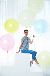 A model wearing size 8 of the Denim Jegging in colour LightDenim (Blue), from the front, showing the whole outfit