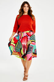 Model Laura wearing size 14 of the Printed Knee Length Skirt in colour Bloom (Pink), from the front, showing the whole outfit