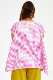 Model Laura wearing size 14 of the Gingham Drape Top in colour Gingham (Pink), from the back