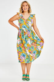 Model Jess wearing size 14 of the V Neck Gathered Sleeve Dress in colour Garden, from the front, showing the whole outfit