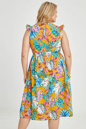 Model Keeara wearing size 16 of the V Neck Gathered Sleeve Dress in colour Garden, from the back