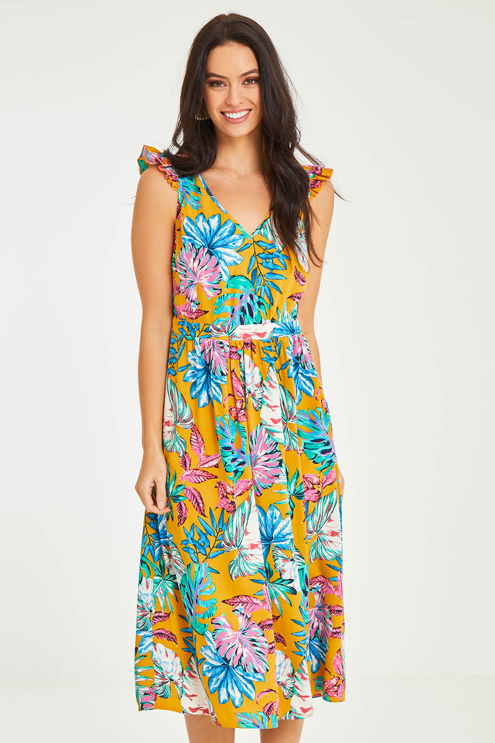 Model Stacey wearing size 10 of the V Neck Gathered Sleeve Dress in colour Garden, from the front, cropped image