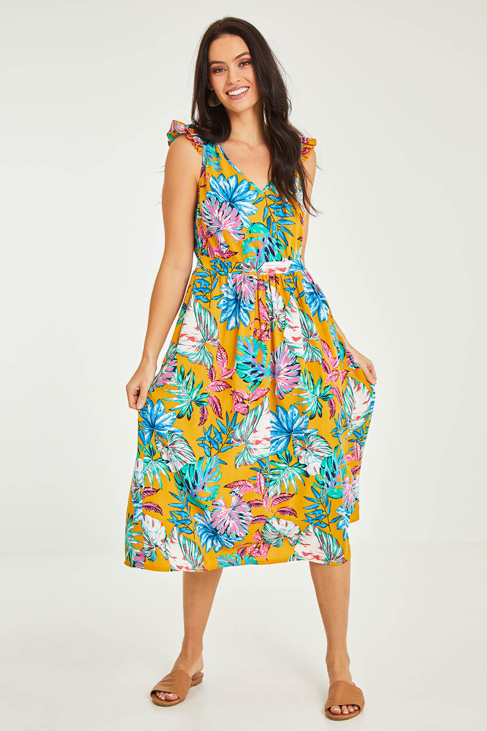 Model Stacey wearing size 10 of the V Neck Gathered Sleeve Dress in colour Garden, from the front, showing the whole outfit