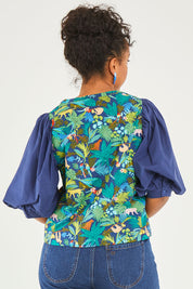 Model Noli wearing size 14 of the Printed Full Sleeve Top in colour Jungle (Blue), from the back