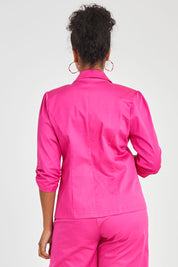 Model Noli wearing size 14 of the Buttoned Blazer in colour Hotpink (Pink), from the back