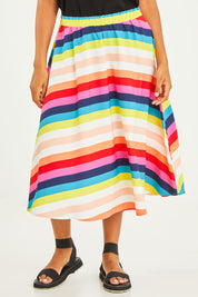 Model Noli wearing size 14 of the Gathered Waist Calf Length Skirt in colour Potofgold (White), from the front, cropped image
