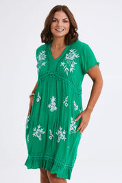 Model Monique wearing size 14 of the Embroidered Lace Detail Dress in colour Greenwhite (Green), from the front, cropped image