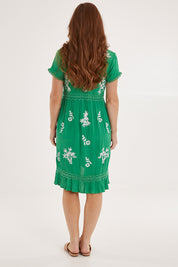 Model Sally wearing size 10 of the Embroidered Lace Detail Dress in colour Greenwhite (Green), from the back