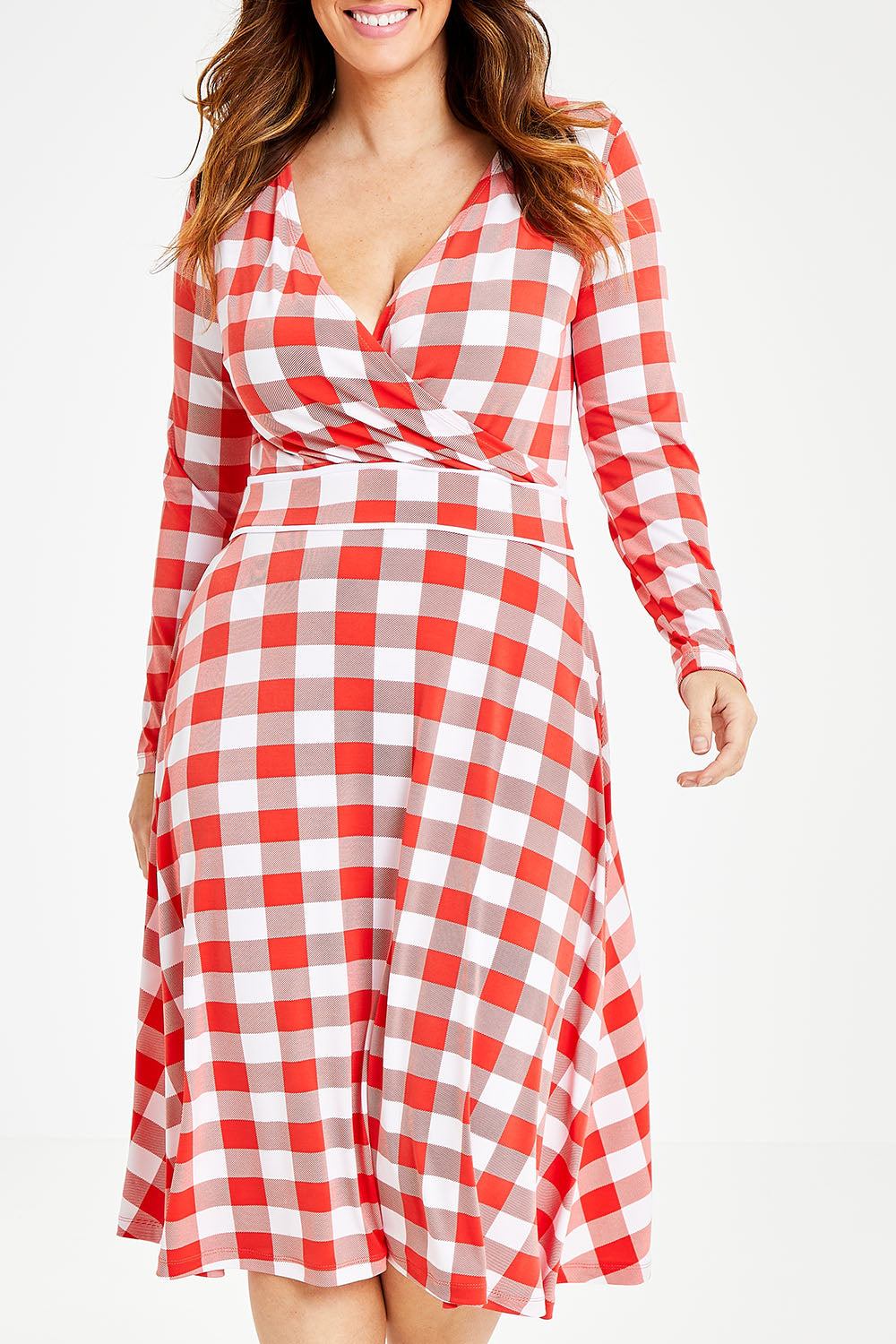 Model Laura wearing size 14 of the Printed Faux Wrap Dress in colour Redcheck (Red), from the front, cropped image