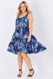 Model Jess wearing size M of the Mirimar Dress in colour Lantana (Blue), from the front, showing the whole outfit