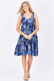 Model Maddy wearing size S of the Mirimar Dress in colour Lantana (Blue), from the front, showing the whole outfit