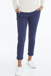 Model Schanez wearing size 10 of the Hesford Chino Trousers in colour Frnavy (Blue), from the front, cropped image
