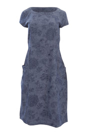 Product shot of the Victoria Dress in colour LinearFlor (Blue), from the front