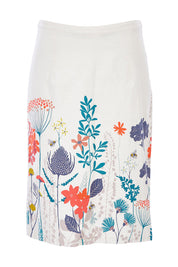 Product shot of the Border Print Fitted Skirt in colour Floralmead (White), from the front