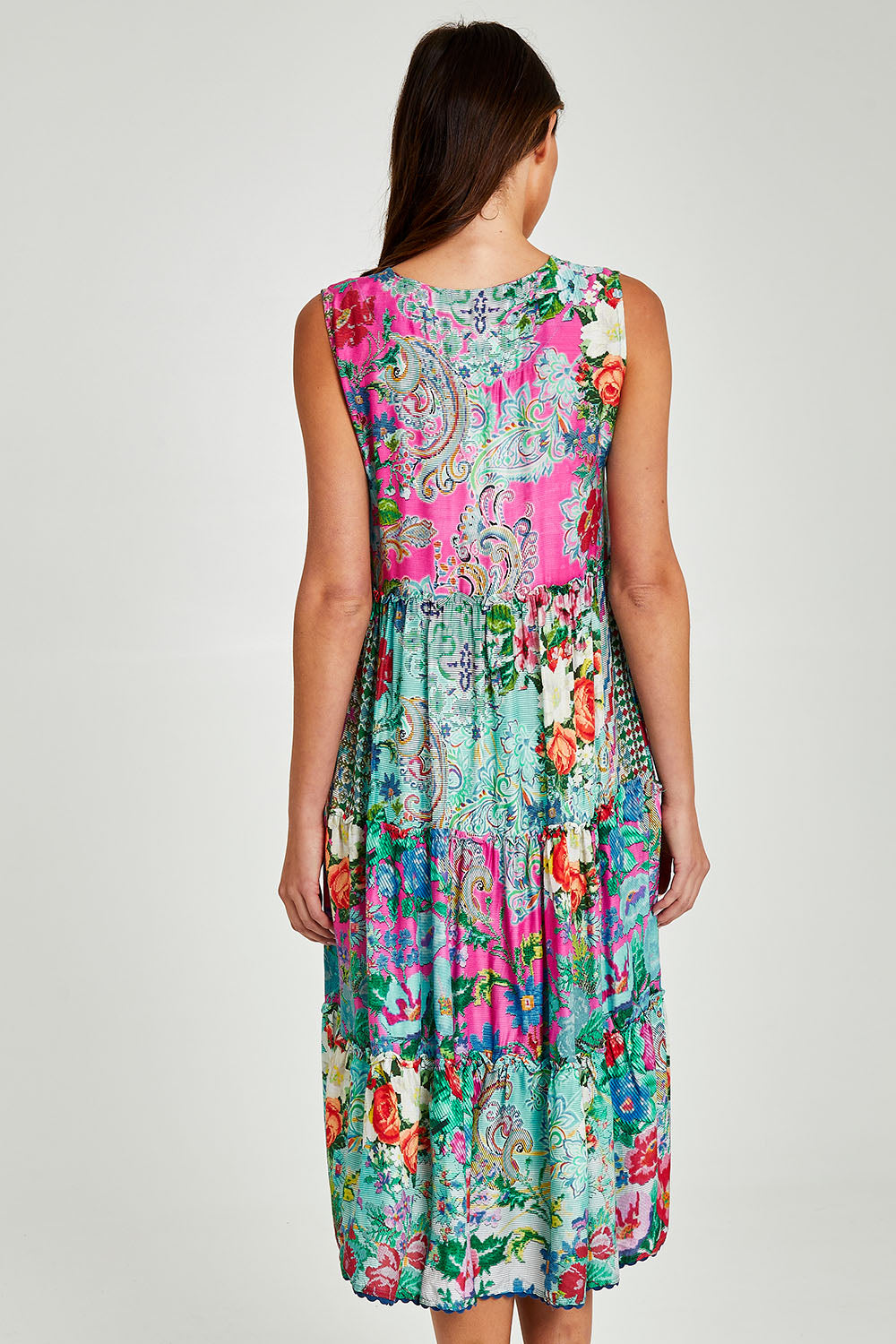 Model Madeline wearing size S of the Finch Sleeveless Midi in colour Multi (Blue), from the back