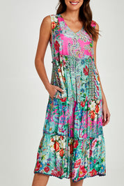 Model Madeline wearing size S of the Finch Sleeveless Midi in colour Multi (Blue), from the front, cropped image