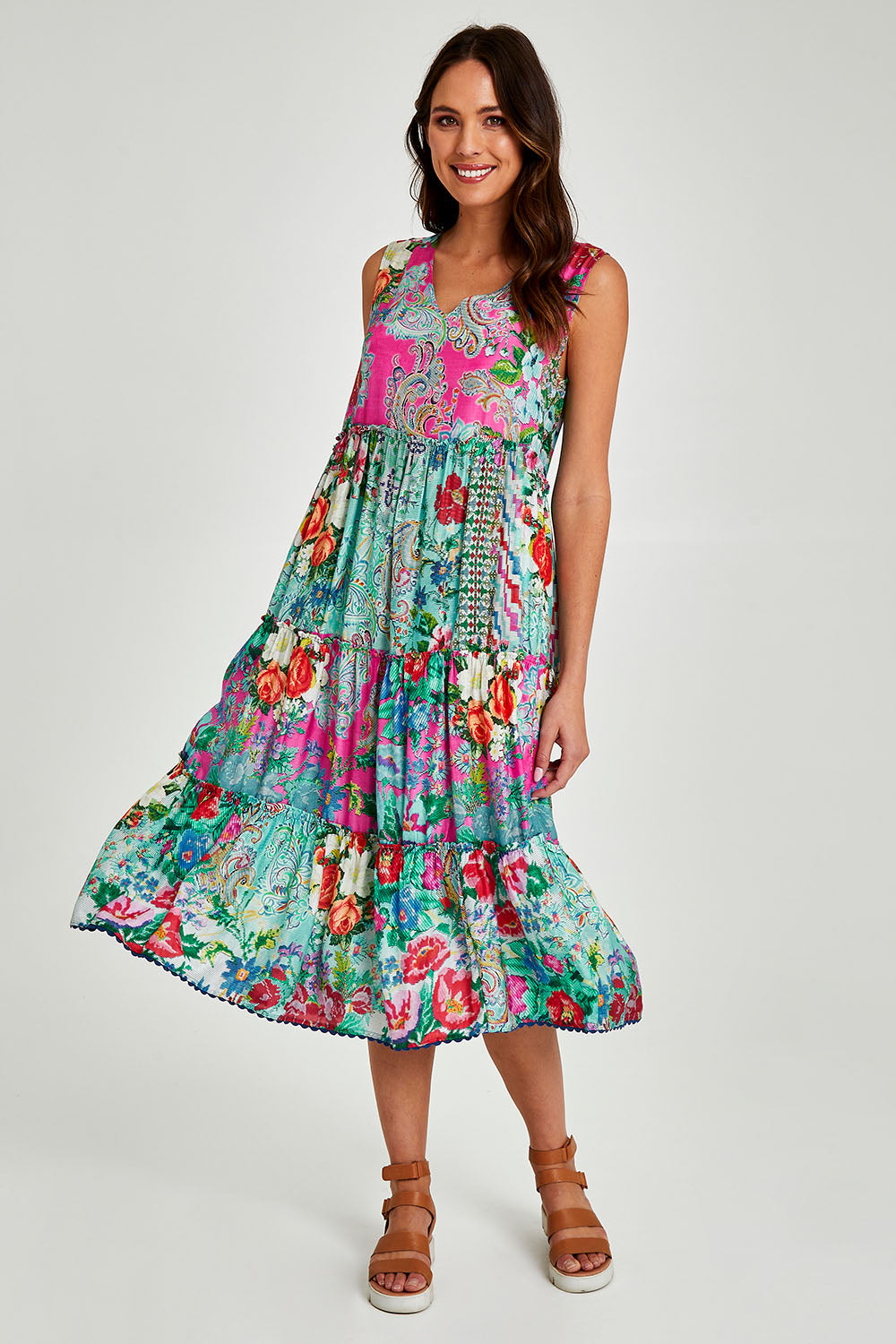 Model Madeline wearing size S of the Finch Sleeveless Midi in colour Multi (Blue), from the front, showing the whole outfit