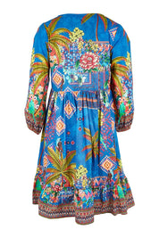 Product shot of the Mika Dress in colour Ocean (Blue), from the back