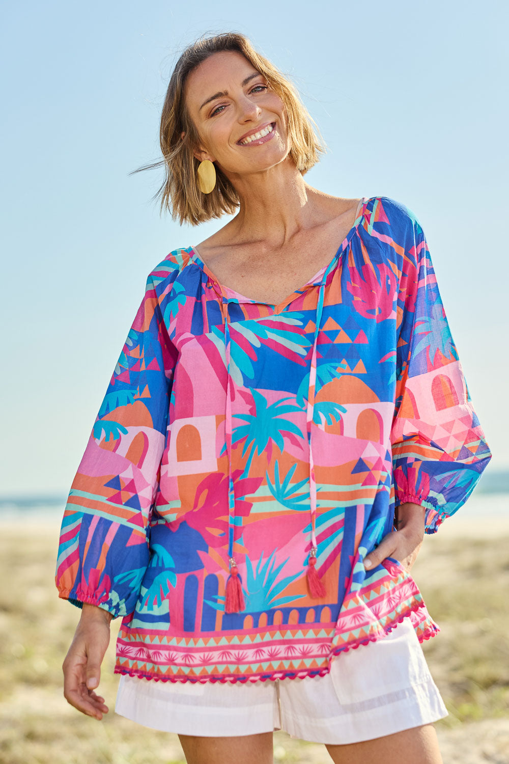Model Riina wearing size S of the Rowanna Cotton Top in colour Blue (Blue), from the front, showing the whole outfit