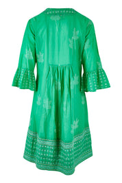Product shot of the Bells Dress in colour Sea (Green), from the back