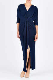Model Rebecca wearing size 10 of the Nadine Dress in colour NavyBlue (Blue), from the front, cropped image
