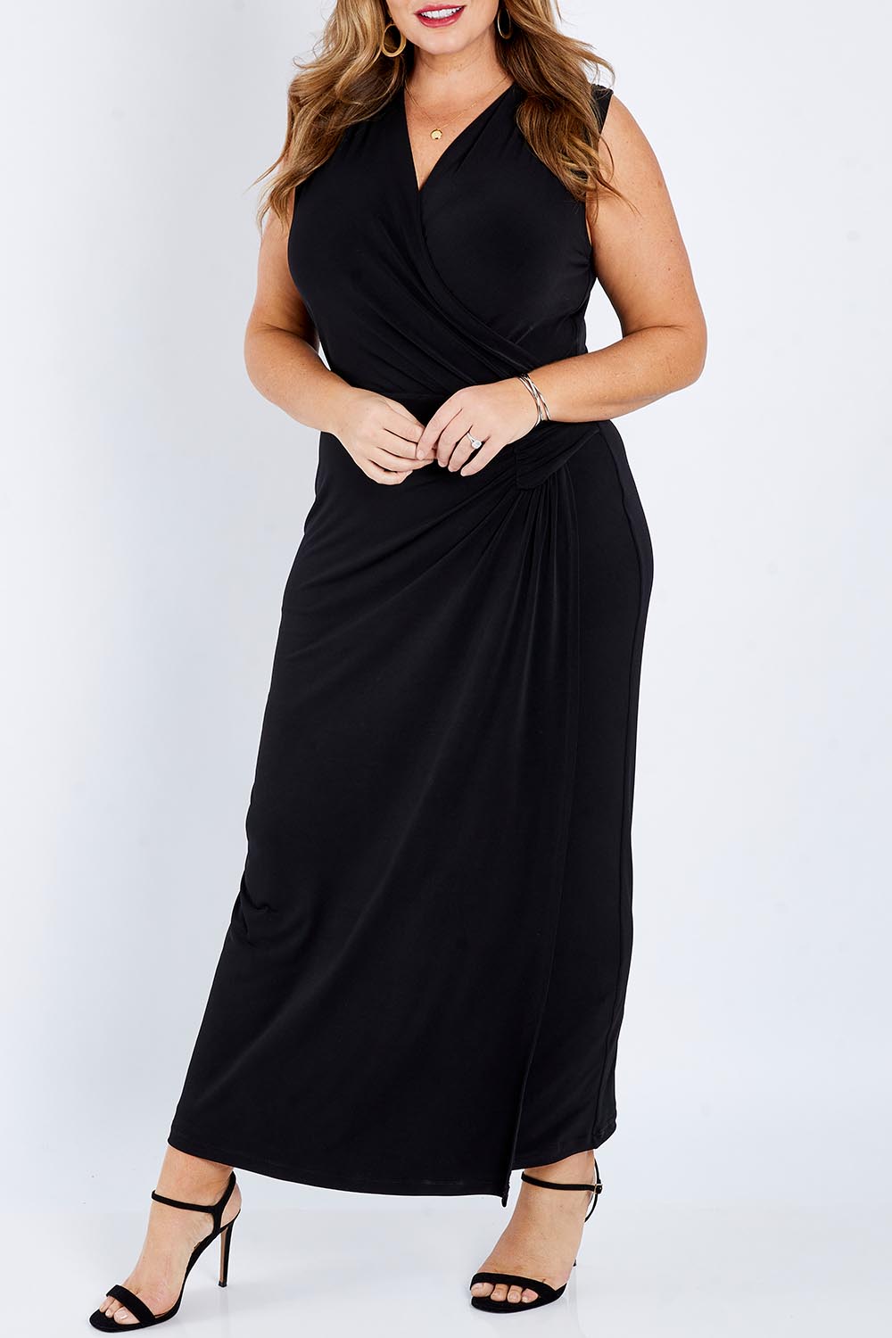 Model Fiona wearing size 16 of the Elisha Dress in colour Black (Black), from the front, cropped image